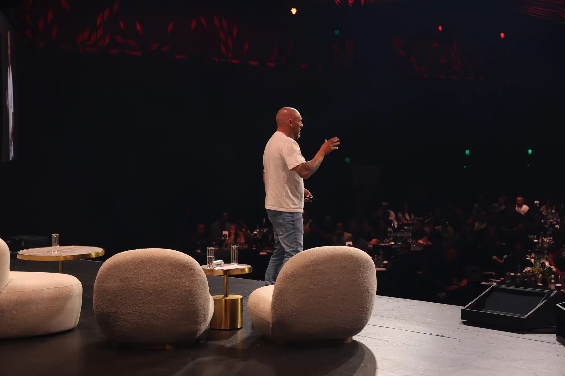 Joshua sharing ideas with an audience at a keynote